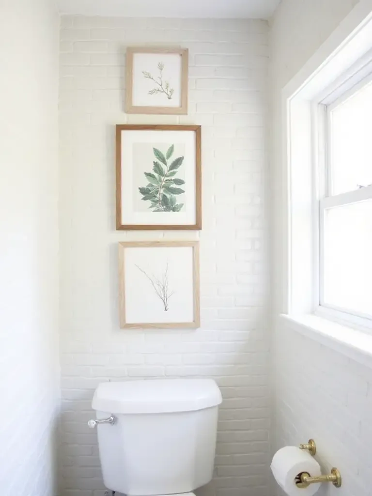 Budget bathroom with gallery wall of framed art prints